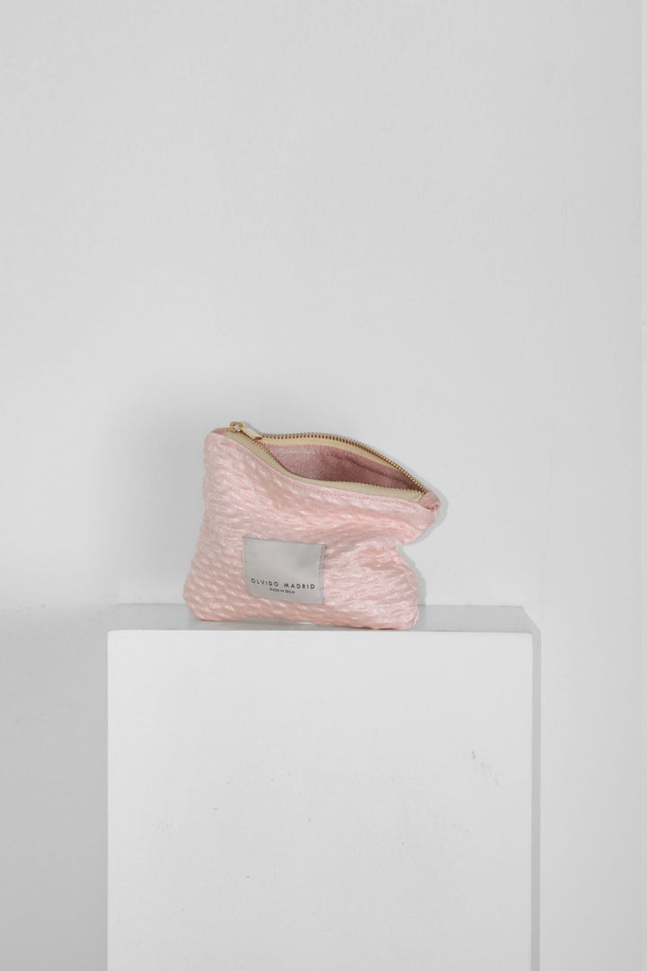 Carterita · tejido textura rosa